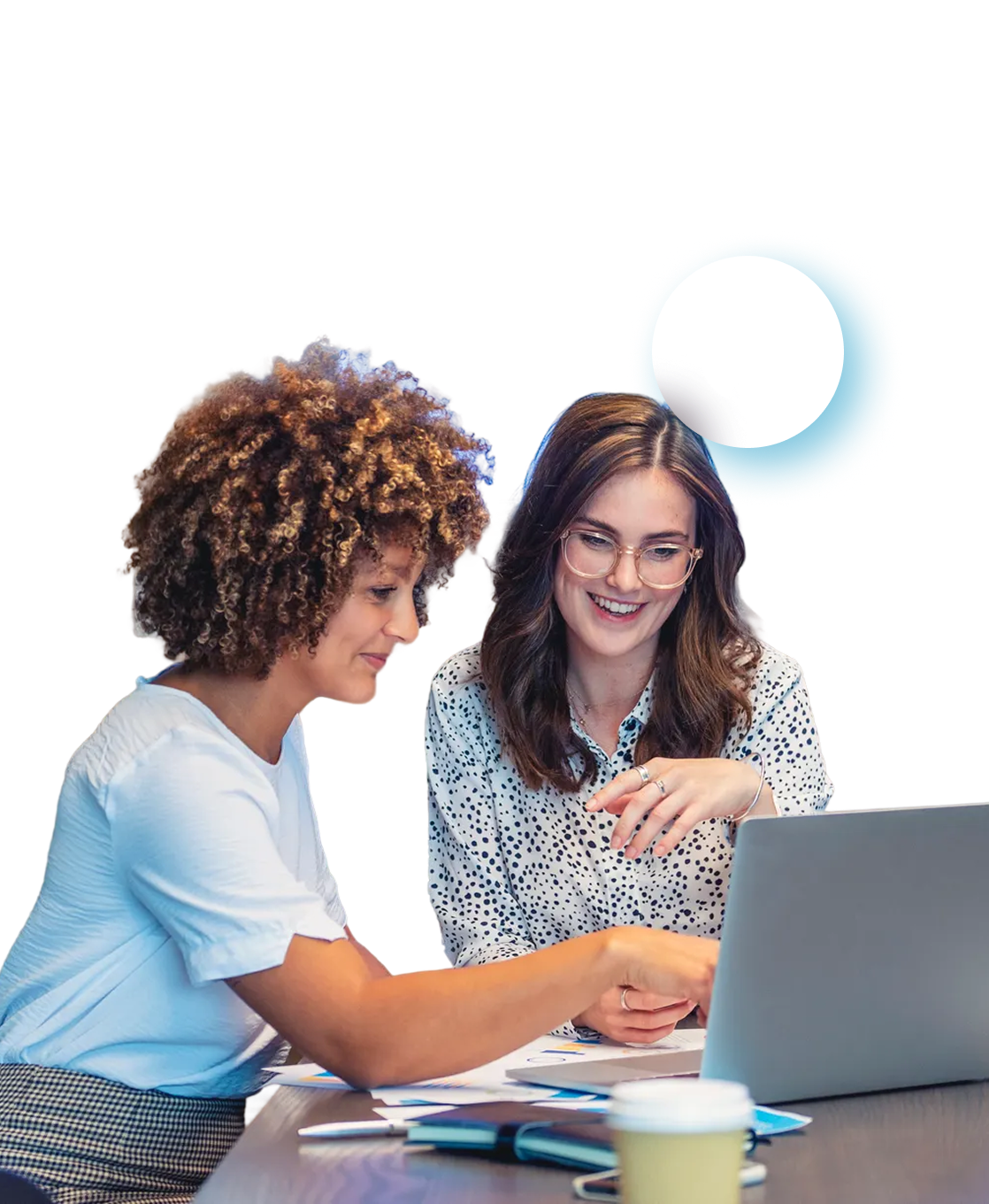 2 women working together on a laptop