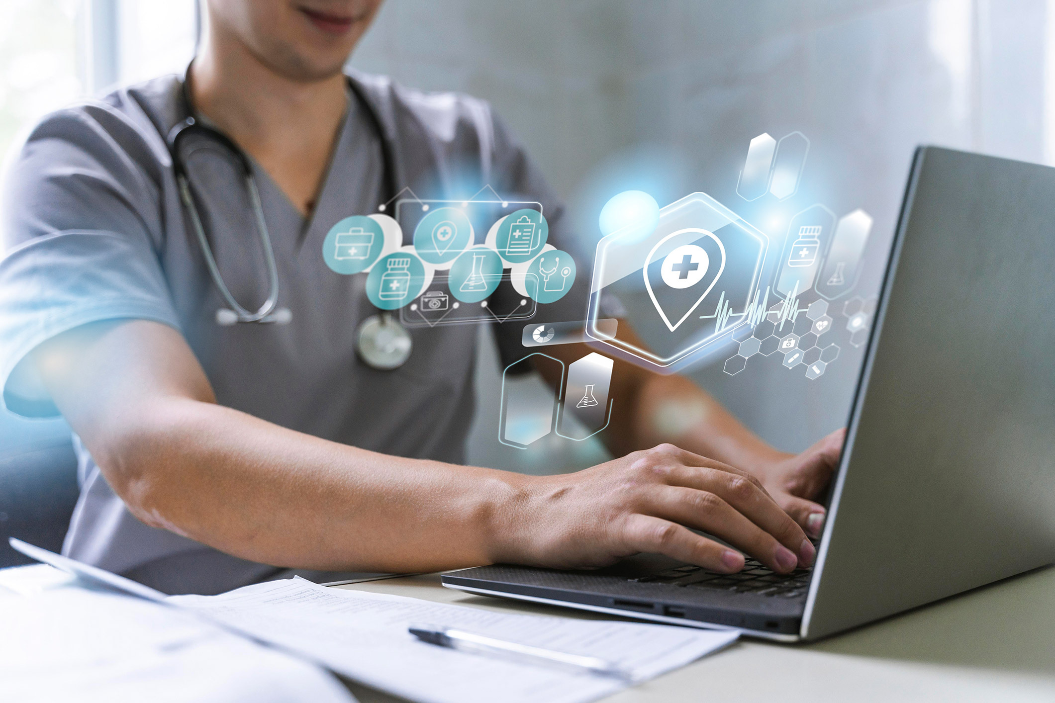 Healthcare worker on a laptop