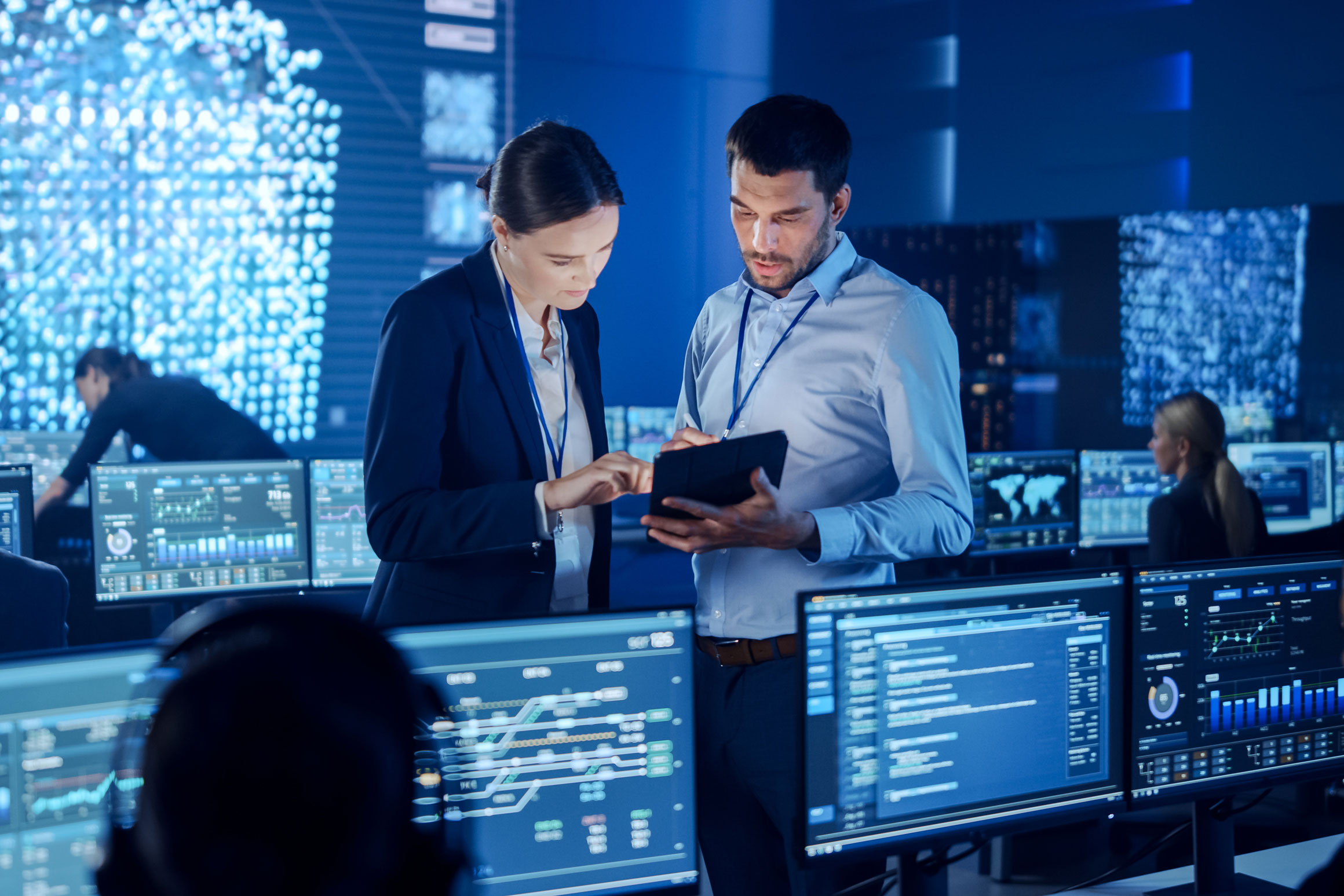 2 people working in cyber security